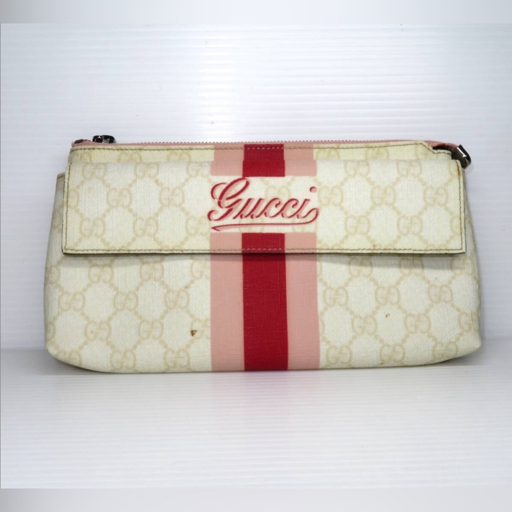 SOLD Gucci GG Supreme body bag waist bag